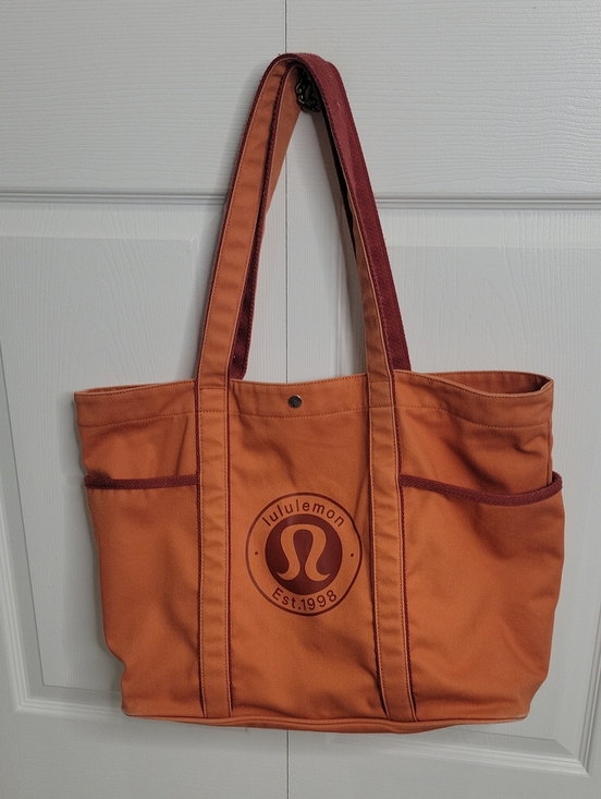 lululemon athletica Handbags - Lululemon Athletica Orange Daily Multi-Pocket Canvas Tote with Burgundy Trim